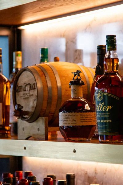 Shot of Bartolino's The Hill wine and spirits on a shelf